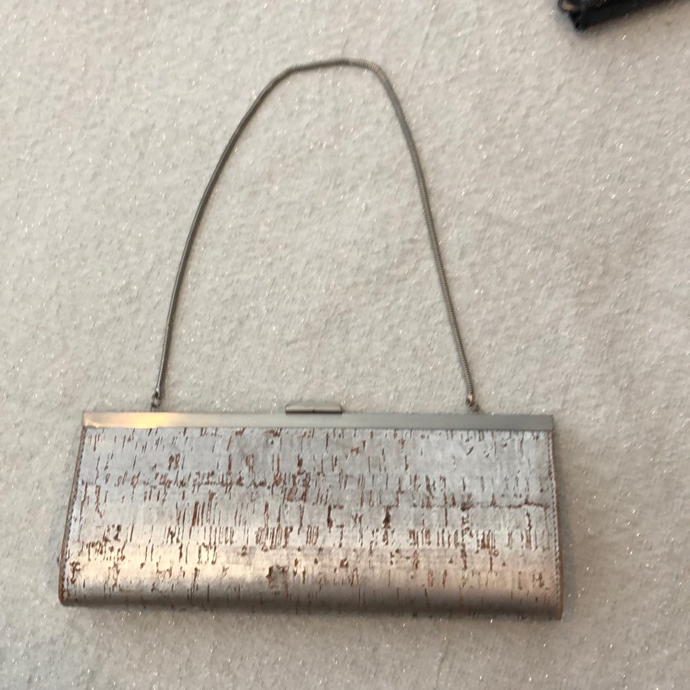 Cute silver cork clutch with optional chain.
